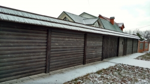 Забор обшитый деревом