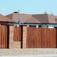 Забор обшитый деревом