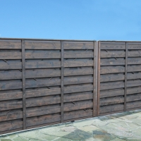 Забор обшитый деревом