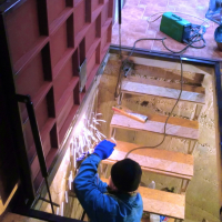 Автоматический люк в подвал дома.