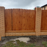 Забор обшитый деревом