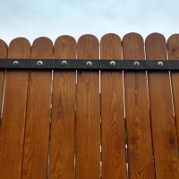 Забор обшитый деревом