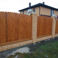 Забор обшитый деревом