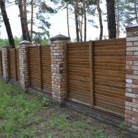 Забор обшитый деревом